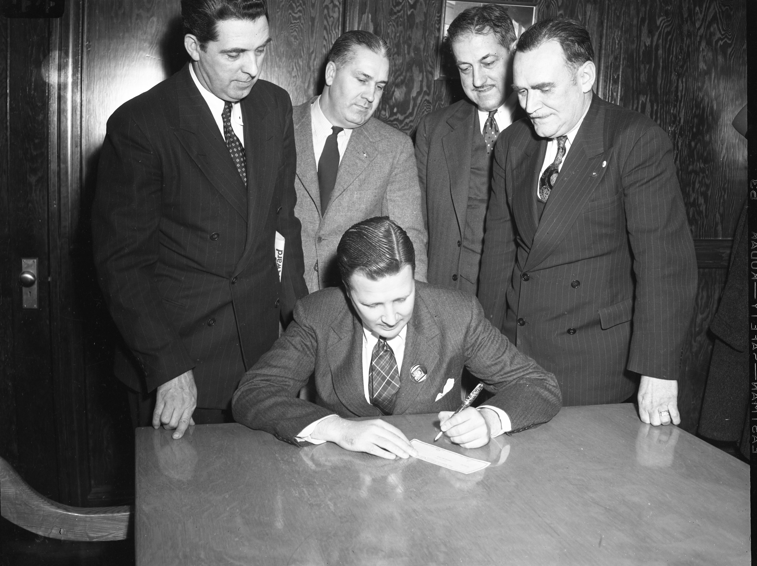 Henry Ford II presenting check to American Red Cross